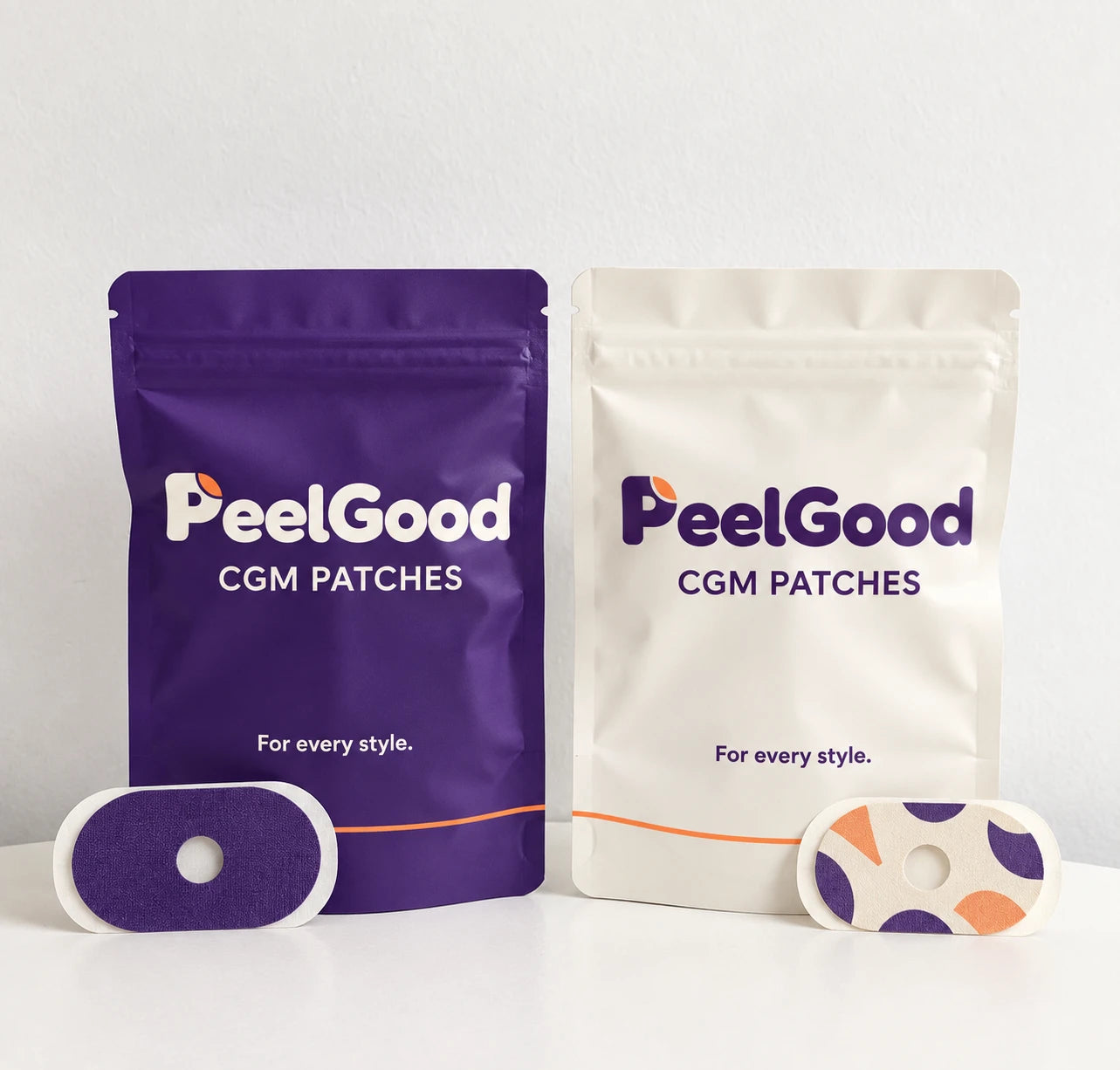 PeelGood CGM patch pouches in violet and cream, with colorful patch designs